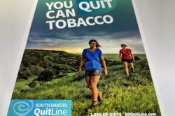 Bild mit zwei Personen und Aufschrift Tobacco